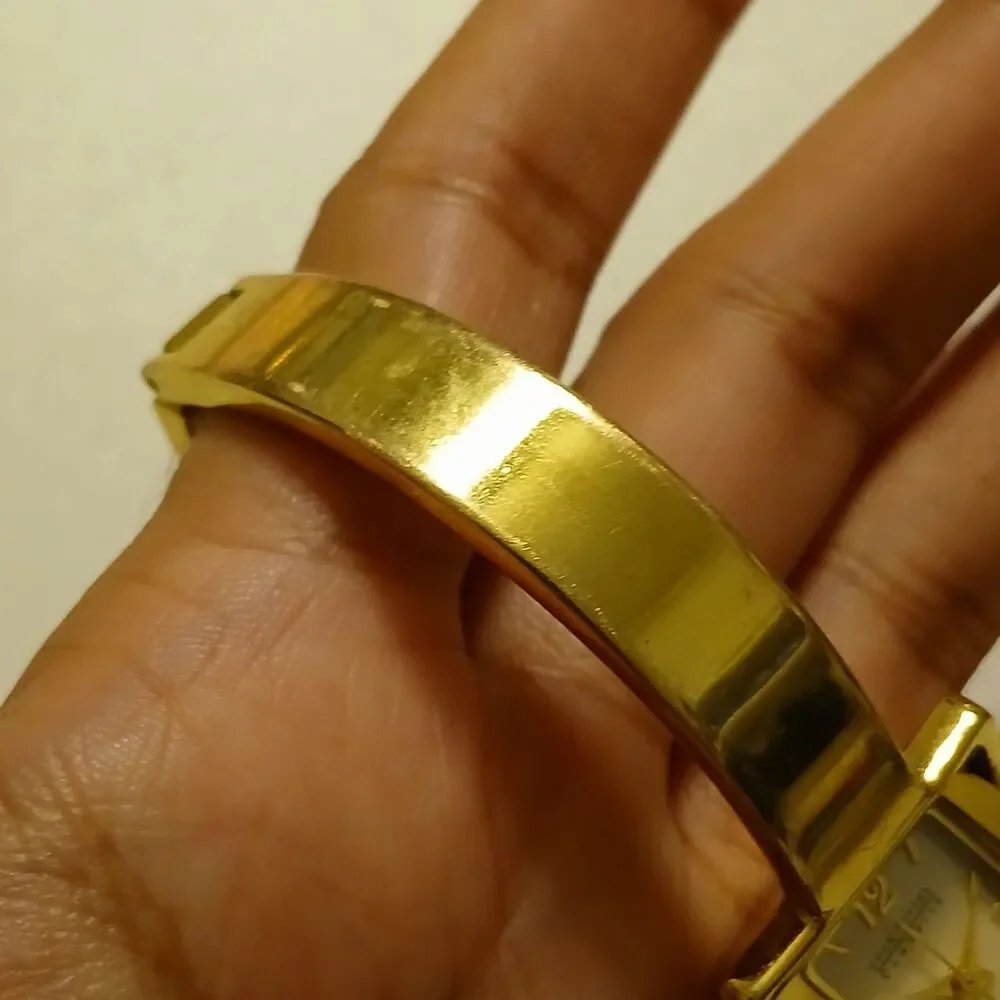 VTG 90s Joan Rivers Classics Gold Tone MOP Dial Quartz Bangle Women's Watch 19mm